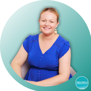 Stacy Munzenberger, Director and Founder at Aqua Legal, smiling confidently in a professional setting.